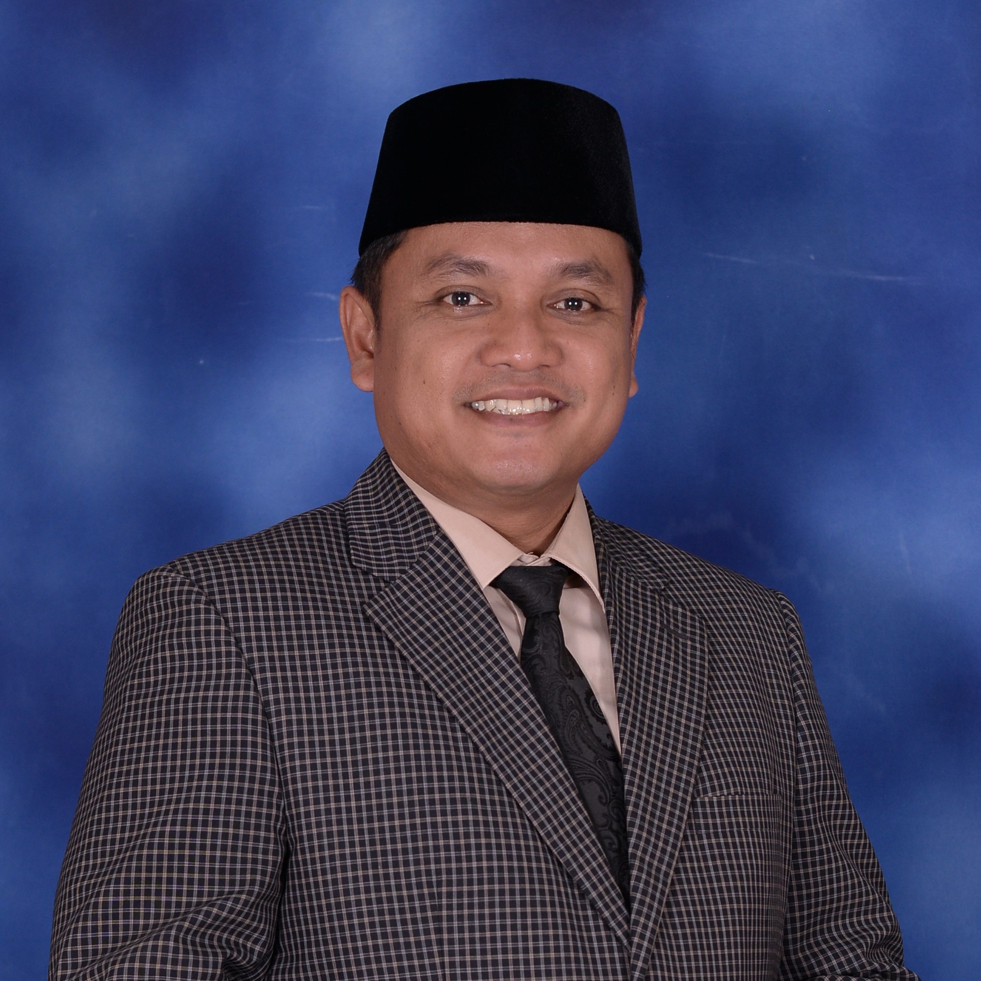 Ahmad Jauhari, S.Fil.I., M.Pd.